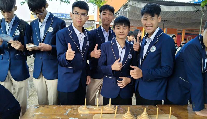 A group of boys in blue uniformsAI-generated content may be incorrect.